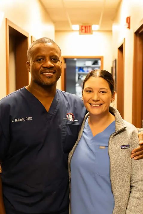 dr-bullock-with-dental-team-member